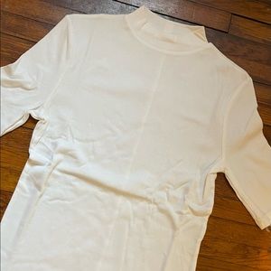 White mock neck top
